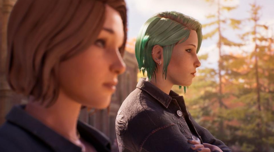 Two girls standing outdoors in autumn, one with short brown hair and one with green hair looking serious