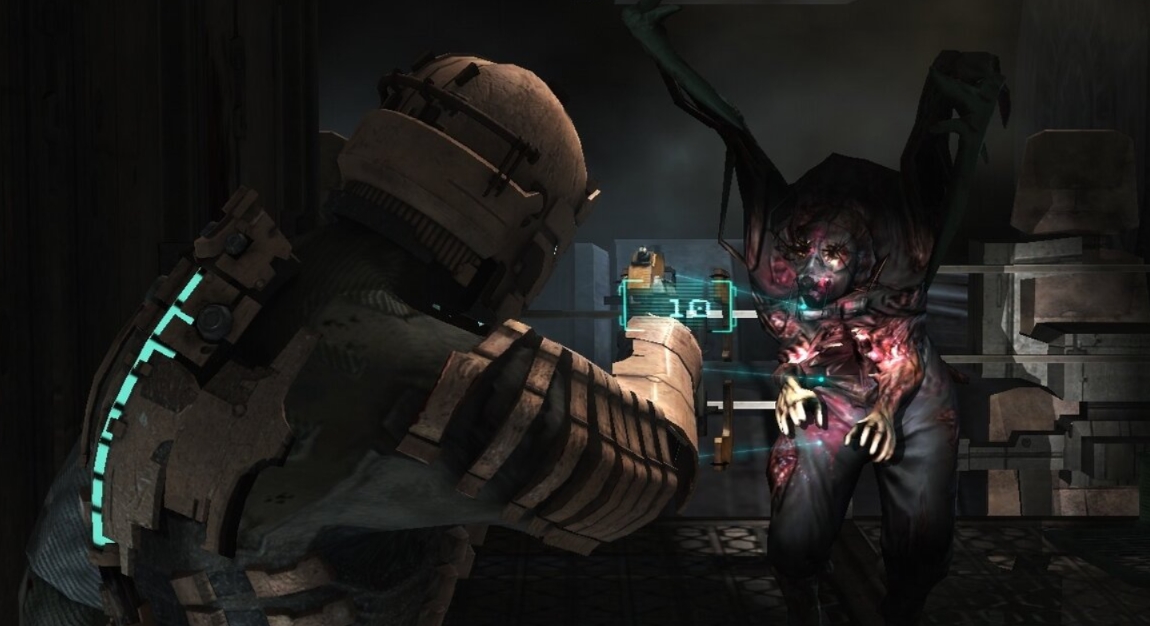 Isaac Clarke fighting a terrifying Necromorph in Dead Space