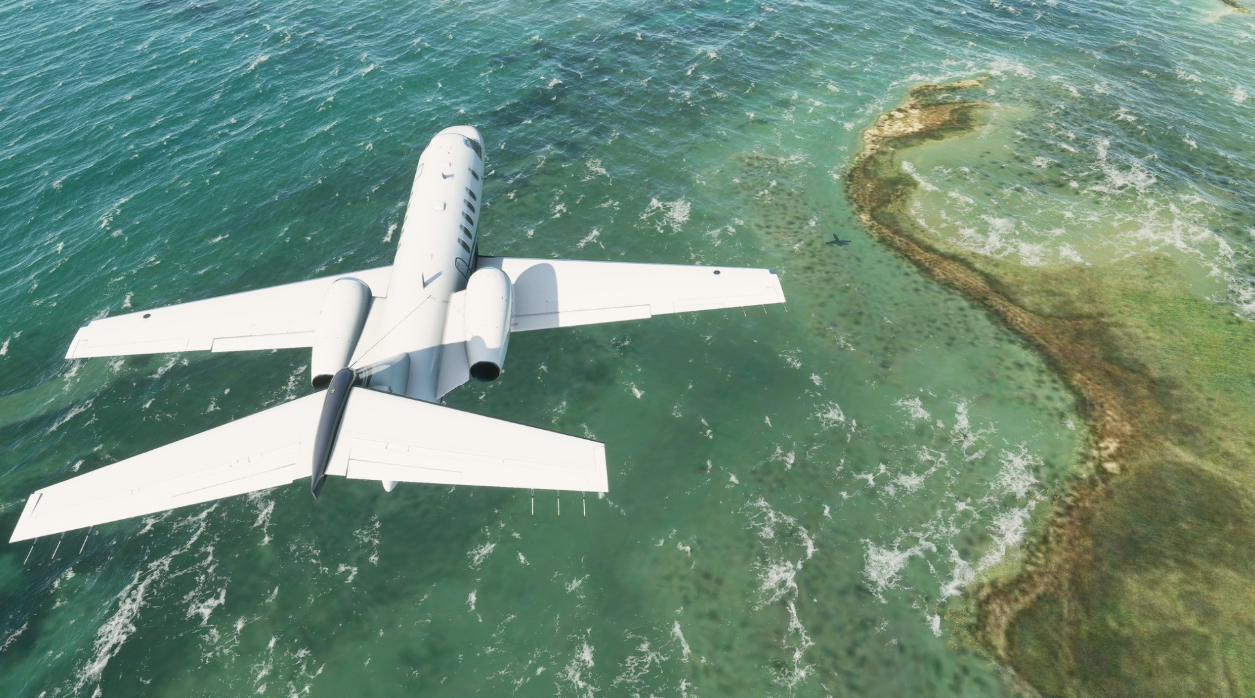 Private jet flying above a tropical ocean in Microsoft Flight Simulator