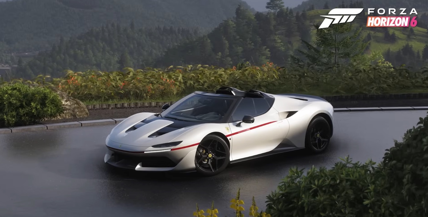 A white Ferrari drives along a scenic mountain road in a Forza Horizon 6 screenshot