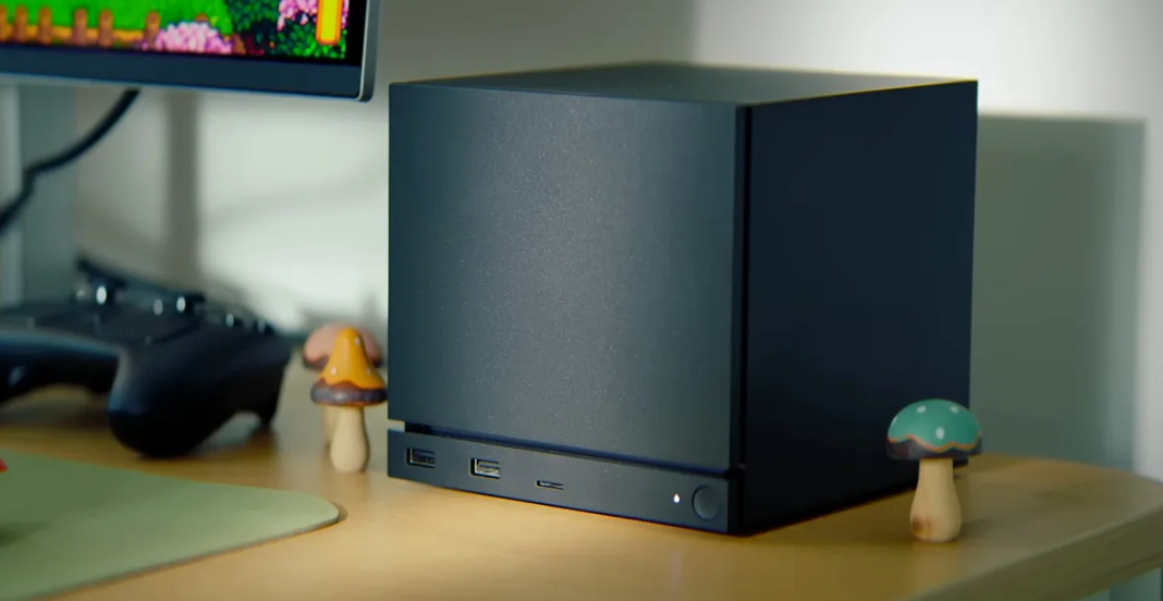 Steam Machine on a desk setup — the RDNA 3-based console gains FSR 4.1 upscaling in the latest test update