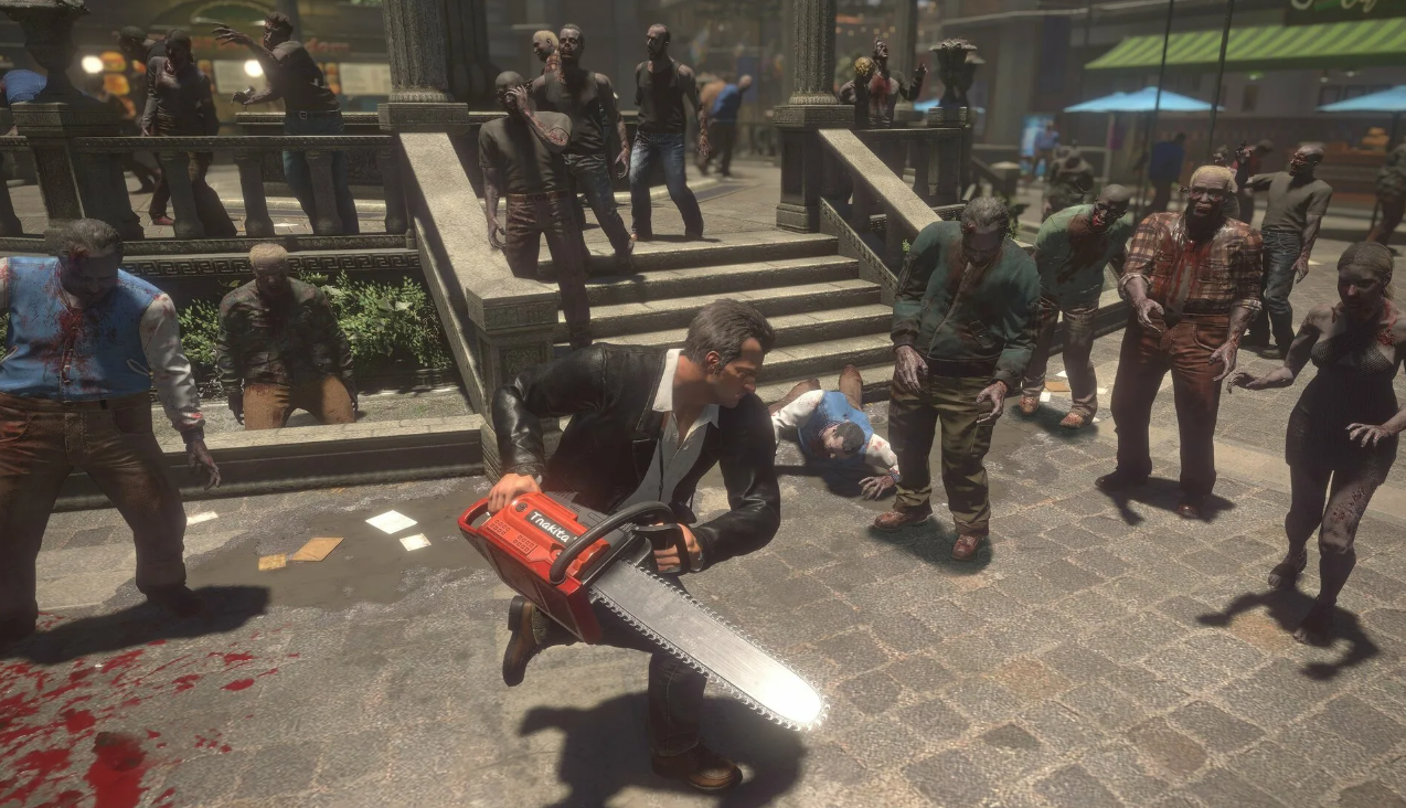 Chuck Greene fighting a zombie horde with a chainsaw in Dead Rising 2