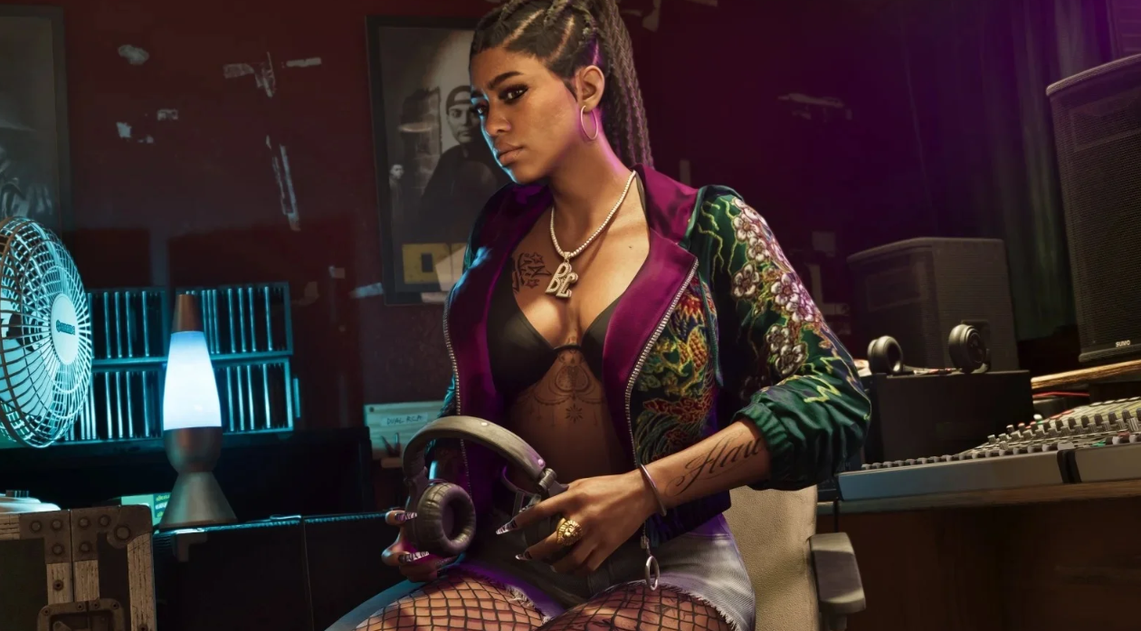 Lucia Caminos, GTA VI's first playable female protagonist, sitting in a music studio surrounded by speakers and mixing gear