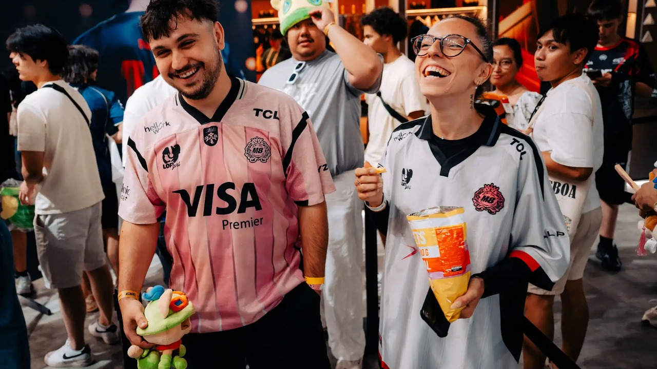 Two Fortnite competitors stand in the event area