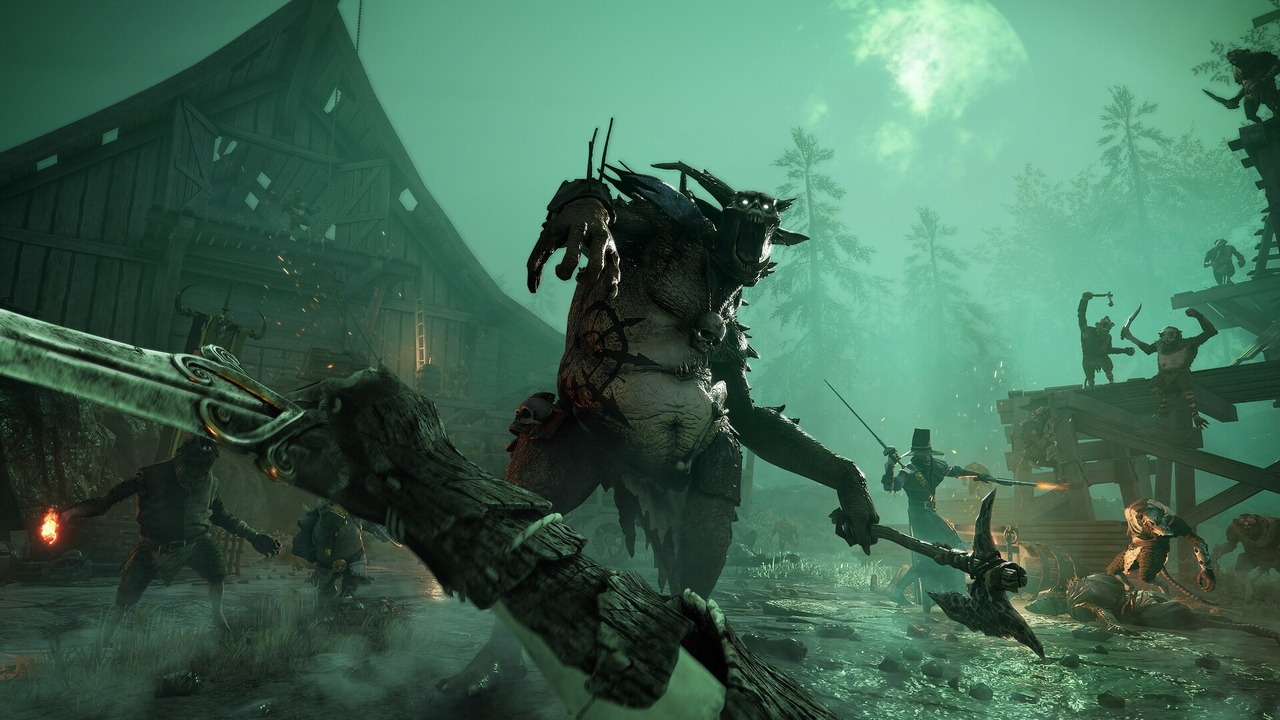 A Vermintide 2 team moves through a ruined area
