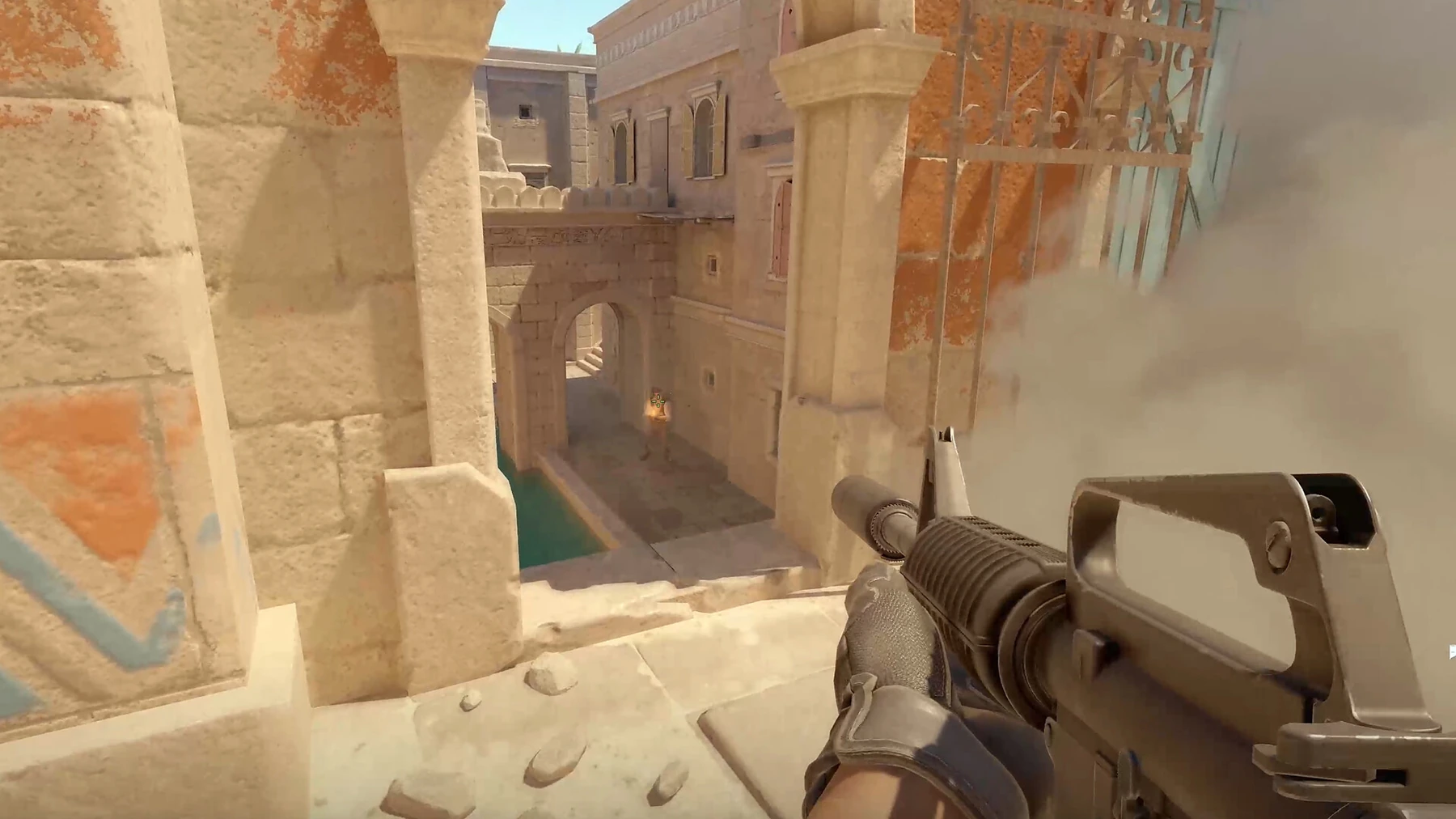 An official Counter-Strike 2 image showing a smoke-covered approach.